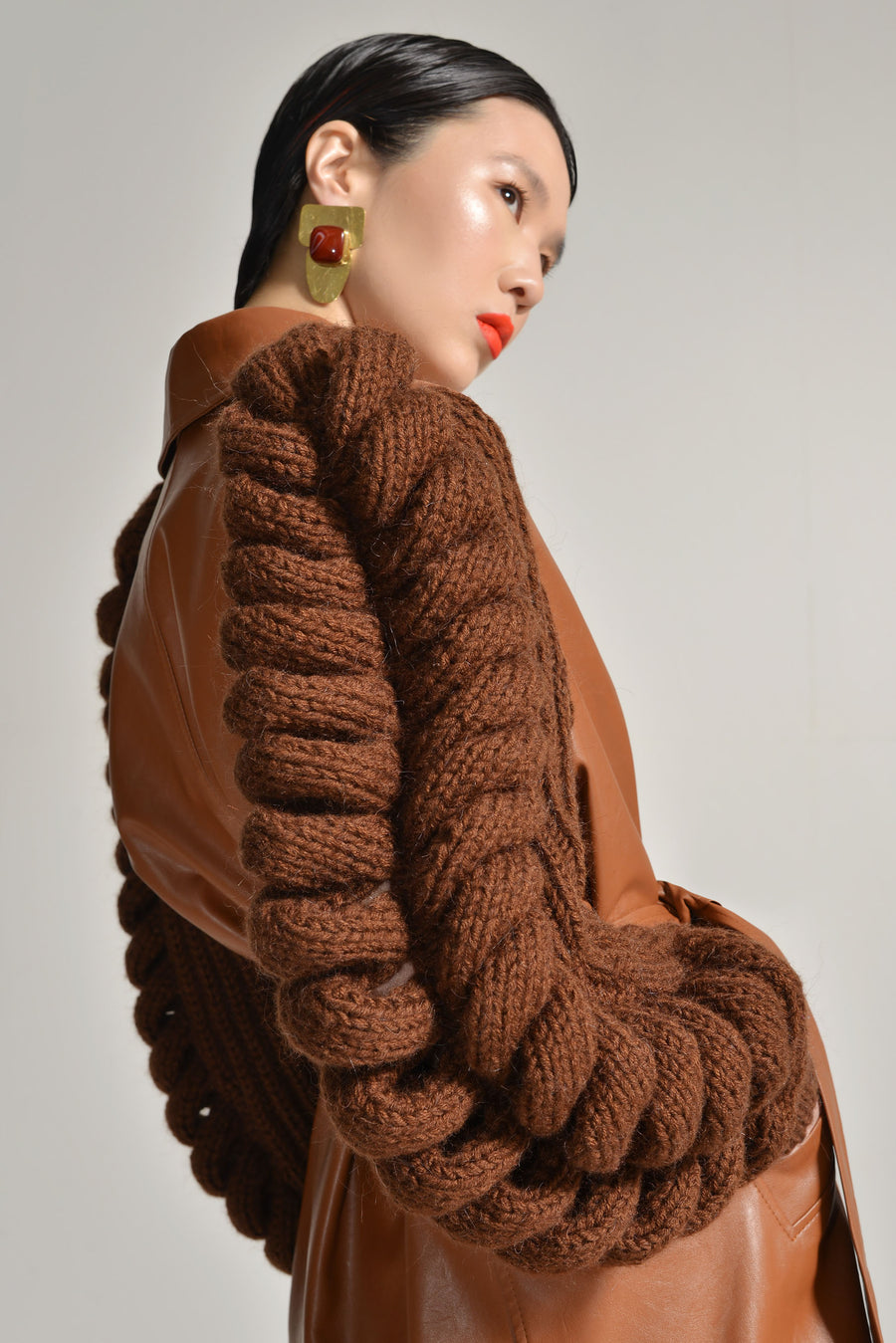 Faux Leather Coat With Knitted Sleeves